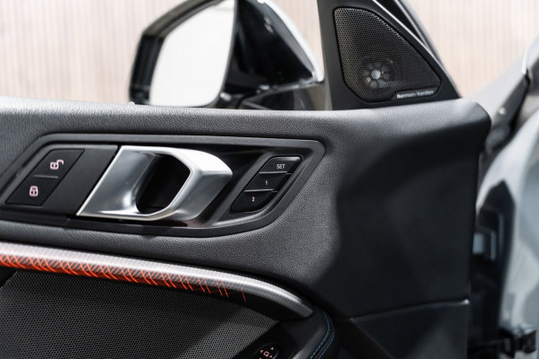 BMW 1-serie 118i M-Sport Pano HUD HK Muziek Kuipstoelen BTW