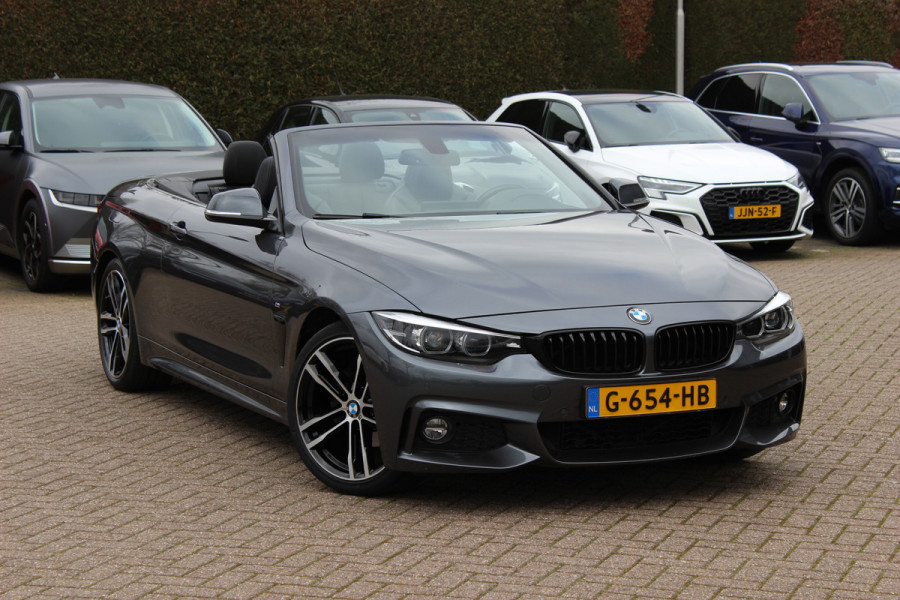 BMW 4 Serie Cabrio 420i High Executive Ed. M Sport / Camera / Leder / Harman Kardon / Nekverwarming / 19'' / Navigatie / Windscherm / DAB / Stoelverwarming / Cruise Control