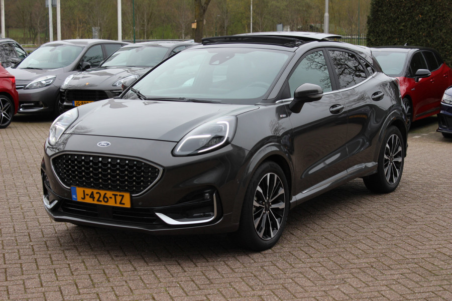 Ford Puma 1.0 EcoBoost Hybrid ST-Line X Vignale 155pk / NL Auto! / Full option! / Trekhaak / Panoramadak / Camera / Leder / CarPlay / B&O / 18'' / Keyless / Stuur+Stoelverwarming / Dodehoek / DAB / Verwarmde voorruit / ACC