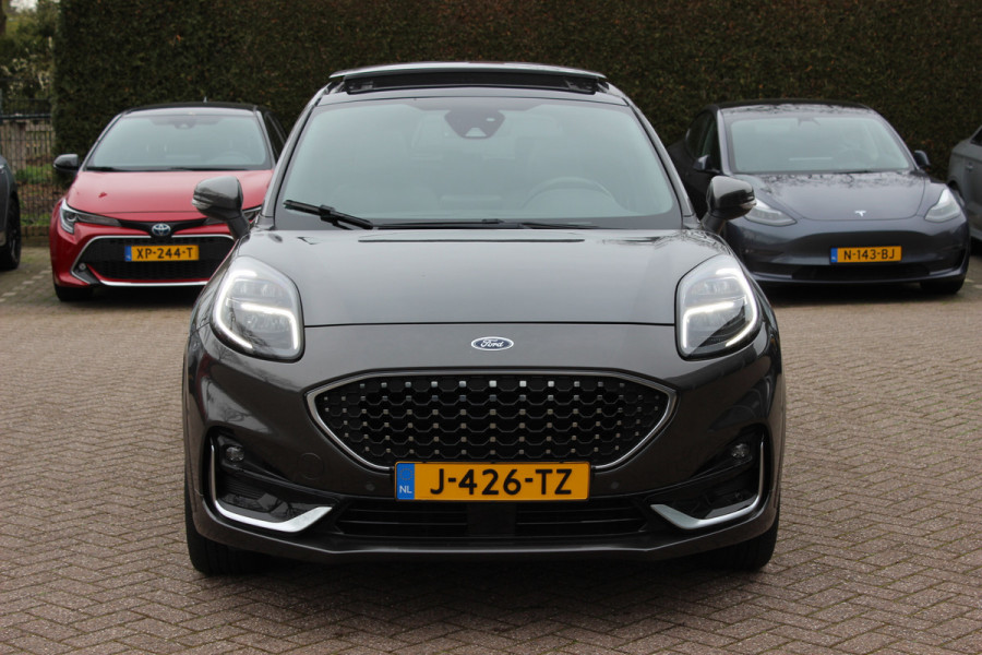 Ford Puma 1.0 EcoBoost Hybrid ST-Line X Vignale 155pk / NL Auto! / Full option! / Trekhaak / Panoramadak / Camera / Leder / CarPlay / B&O / 18'' / Keyless / Stuur+Stoelverwarming / Dodehoek / DAB / Verwarmde voorruit / ACC