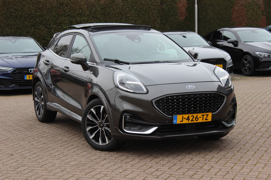Ford Puma 1.0 EcoBoost Hybrid ST-Line X Vignale 155pk / NL Auto! / Full option! / Trekhaak / Panoramadak / Camera / Leder / CarPlay / B&O / 18'' / Keyless / Stuur+Stoelverwarming / Dodehoek / DAB / Verwarmde voorruit / ACC