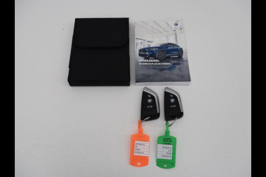 BMW X2 xDrive25e High Executive | SOH 85,7% | Head-Up | Leder | Sportstoelen | Stoelverwarming | Park Assist | Navigatie | Full LED | Climate control | Bluetooth | Cruise control | Individual Storm Bay Metallic