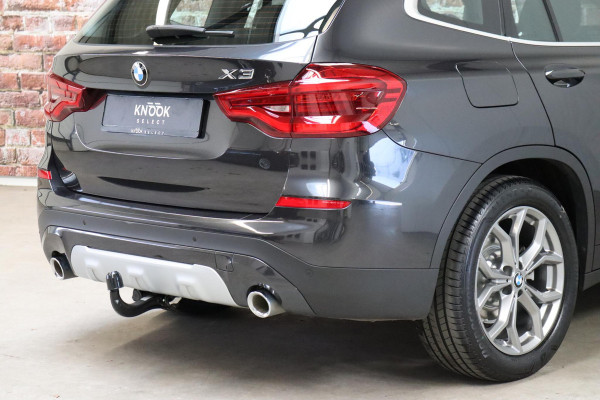 BMW X3 xDrive20i High Executive xLine Automaat / Panoramadak / Trekhaak / Navigatiesysteem Professional / Leder / Comfortstoelen Elektrisch Verstelbaar / Stuurwielverwarming / Chrome Line / Stoelventilatie / Hifi / Multifunctioneel Instrumentendisplay / LED /