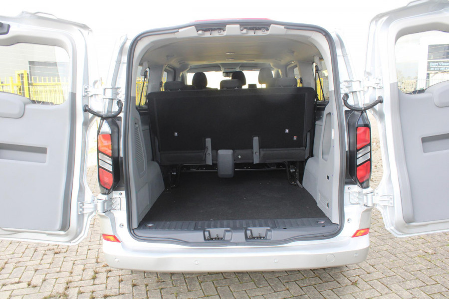 Ford Transit Custom 340 2.5 PHEV L2H1 Limited 233pk |  Kombi | Incl. BTW/BPM | Dubbele zijschuifdeur | Privacy Glass | Inklapbare trekhaak | 17 inch lichtmetalen velgen | Driver Assistance Pack Premium | Verwarmbaar stuurwiel
