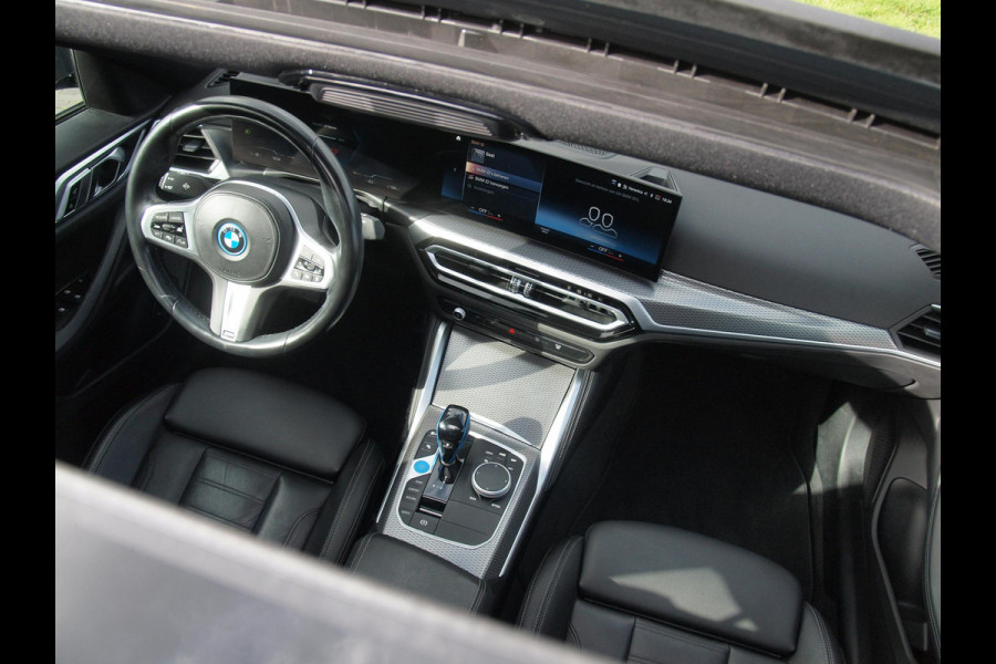 BMW i4 eDrive40 84 kWh | M-Pakket | Schuifdak | Camera | Dravitgrau metallic | NL-Auto |
