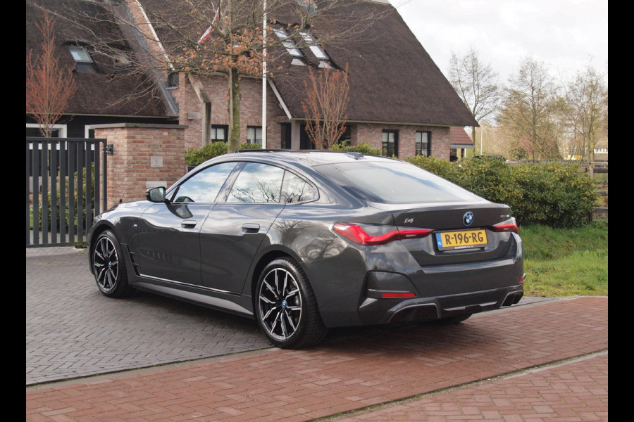 BMW i4 eDrive40 84 kWh | M-Pakket | Schuifdak | Camera | Dravitgrau metallic | NL-Auto |