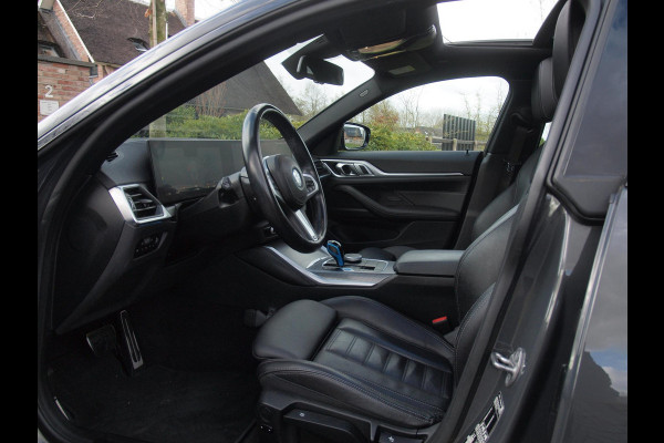 BMW i4 eDrive40 84 kWh | M-Pakket | Schuifdak | Camera | Dravitgrau metallic | NL-Auto |