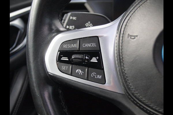 BMW i4 eDrive40 84 kWh | M-Pakket | Schuifdak | Camera | Dravitgrau metallic | NL-Auto |