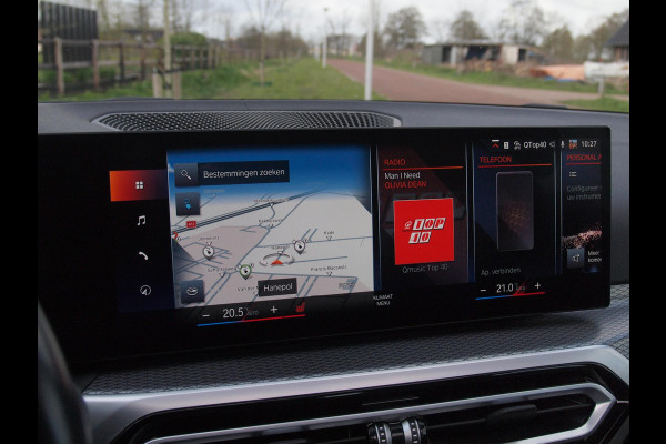 BMW i4 eDrive40 84 kWh | M-Pakket | Schuifdak | Camera | Dravitgrau metallic | NL-Auto |