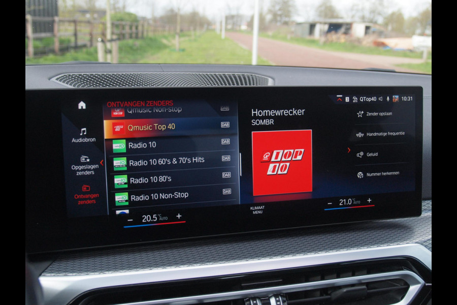 BMW i4 eDrive40 84 kWh | M-Pakket | Schuifdak | Camera | Dravitgrau metallic | NL-Auto |