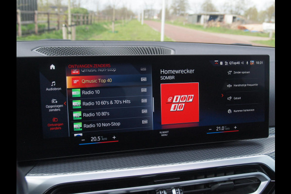 BMW i4 eDrive40 84 kWh | M-Pakket | Schuifdak | Camera | Dravitgrau metallic | NL-Auto |