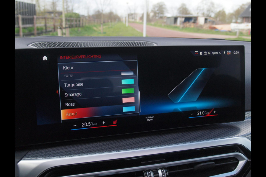 BMW i4 eDrive40 84 kWh | M-Pakket | Schuifdak | Camera | Dravitgrau metallic | NL-Auto |