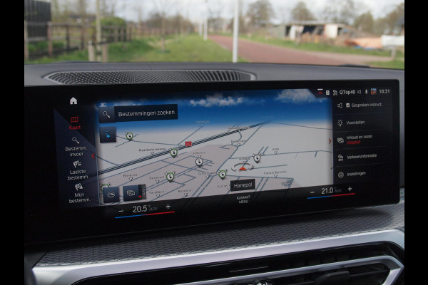 BMW i4 eDrive40 84 kWh | M-Pakket | Schuifdak | Camera | Dravitgrau metallic | NL-Auto |