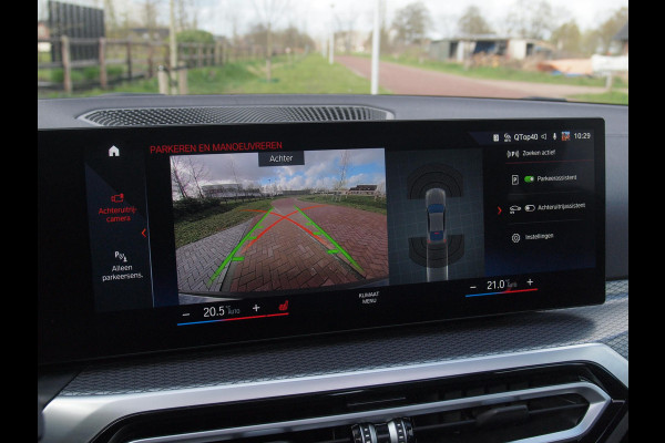 BMW i4 eDrive40 84 kWh | M-Pakket | Schuifdak | Camera | Dravitgrau metallic | NL-Auto |