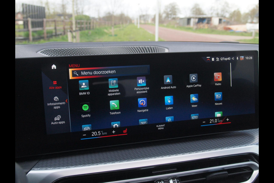 BMW i4 eDrive40 84 kWh | M-Pakket | Schuifdak | Camera | Dravitgrau metallic | NL-Auto |