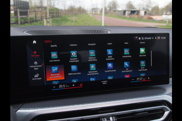 BMW i4 eDrive40 84 kWh | M-Pakket | Schuifdak | Camera | Dravitgrau metallic | NL-Auto |