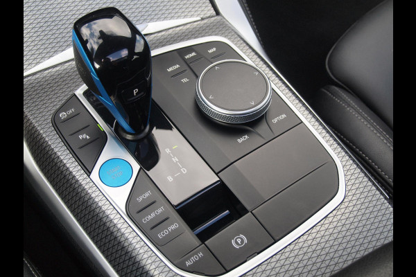 BMW i4 eDrive40 84 kWh | M-Pakket | Schuifdak | Camera | Dravitgrau metallic | NL-Auto |