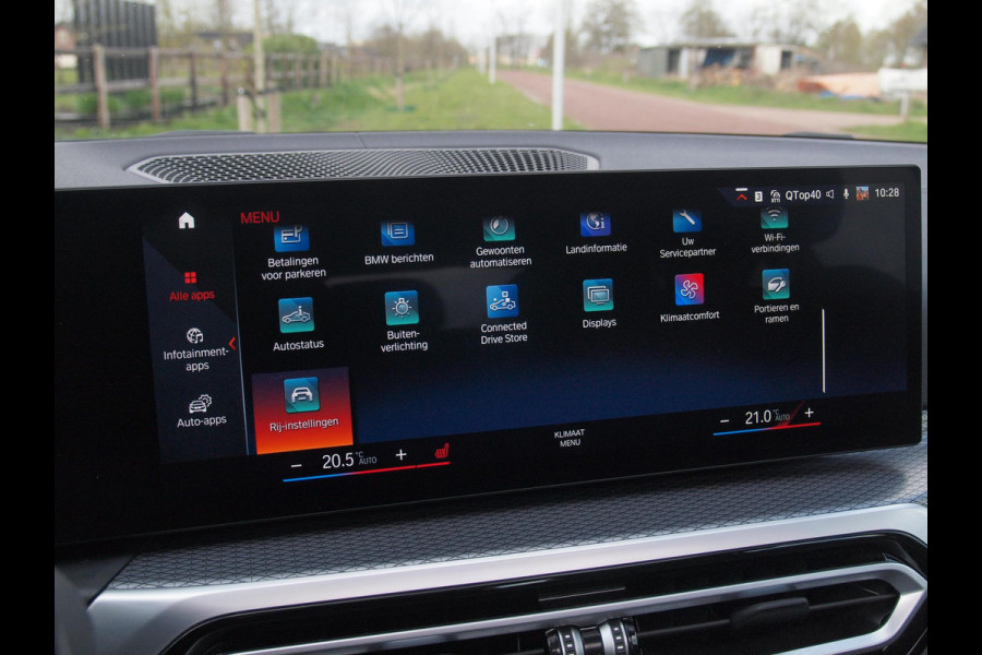 BMW i4 eDrive40 84 kWh | M-Pakket | Schuifdak | Camera | Dravitgrau metallic | NL-Auto |