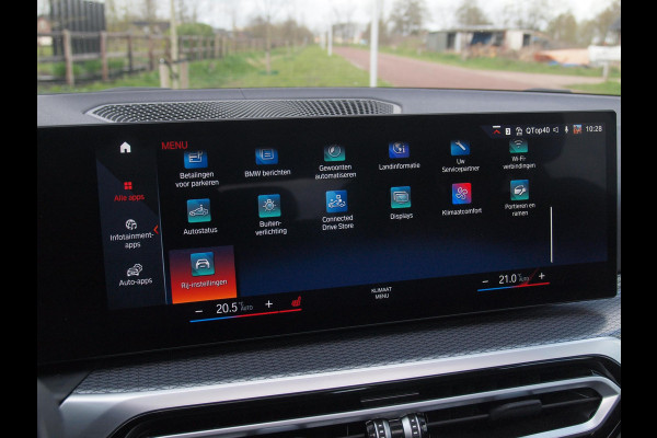 BMW i4 eDrive40 84 kWh | M-Pakket | Schuifdak | Camera | Dravitgrau metallic | NL-Auto |