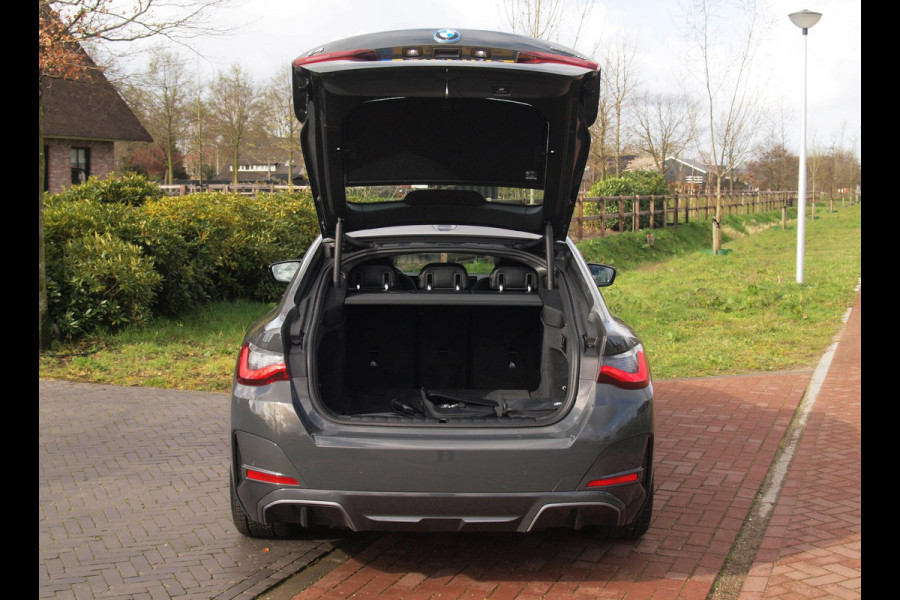 BMW i4 eDrive40 84 kWh | M-Pakket | Schuifdak | Camera | Dravitgrau metallic | NL-Auto |