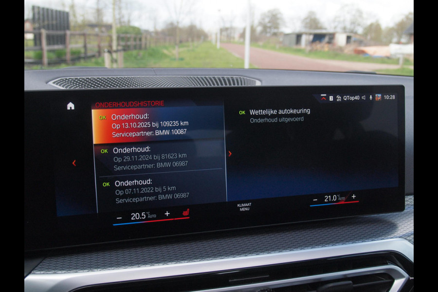 BMW i4 eDrive40 84 kWh | M-Pakket | Schuifdak | Camera | Dravitgrau metallic | NL-Auto |