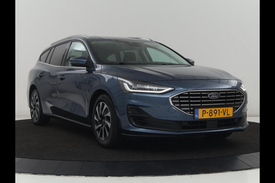 Ford Focus 1.0 EcoBoost Hybrid Titanium Style | Stoelverwarming | Camera | Carplay | Stuurverwarming | Navigatie | Full LED | Park Assist | Climate control | Bluetooth | Cruise control