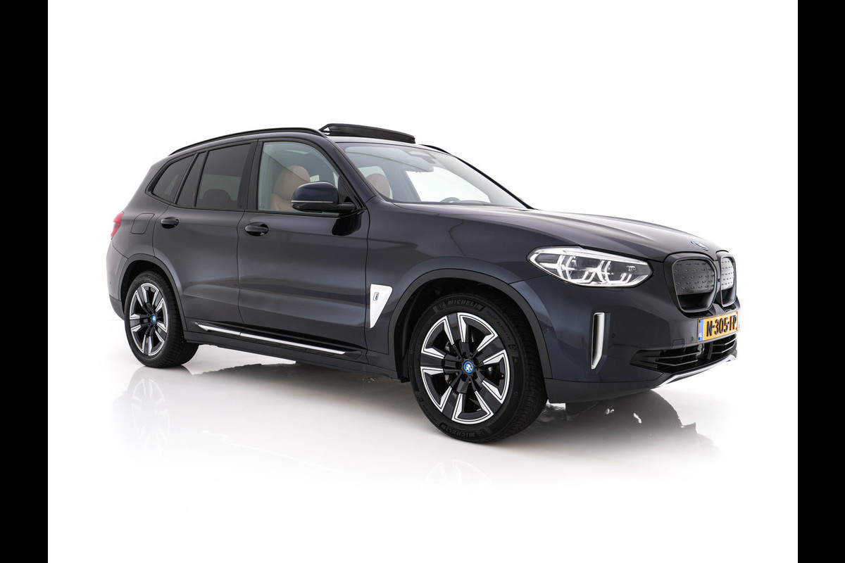 BMW iX3 High Executive 80 kWh [ 3-Fase -11kW] {SOH-98%} (INCL-BTW) Aut. *PANO | LEATHER | HARMAN/KARDON | FULL-LED | BLINDSPOT | MEMORY-PACK | DIGI-COCKPIT | HEATED-SPORTSEATS | KEYLESS | TOPVIEW | DAB+ | NAVI-FULLMAP | HEAD-UP | ...