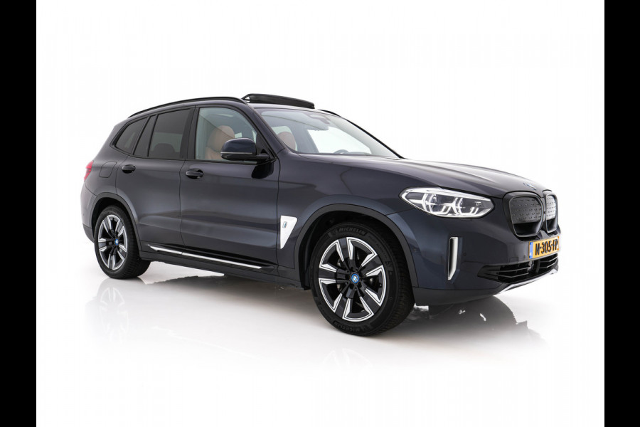 BMW iX3 High Executive 80 kWh [ 3-Fase -11kW] {SOH-98%} (INCL-BTW) Aut. *PANO | LEATHER | HARMAN/KARDON | FULL-LED | BLINDSPOT | MEMORY-PACK | DIGI-COCKPIT | HEATED-SPORTSEATS | KEYLESS | TOPVIEW | DAB+ | NAVI-FULLMAP | HEAD-UP | ...