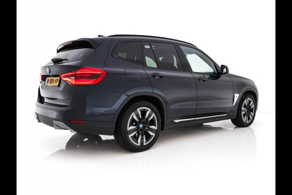BMW iX3 High Executive 80 kWh [ 3-Fase -11kW] {SOH-98%} (INCL-BTW) Aut. *PANO | LEATHER | HARMAN/KARDON | FULL-LED | BLINDSPOT | MEMORY-PACK | DIGI-COCKPIT | HEATED-SPORTSEATS | KEYLESS | TOPVIEW | DAB+ | NAVI-FULLMAP | HEAD-UP | ...