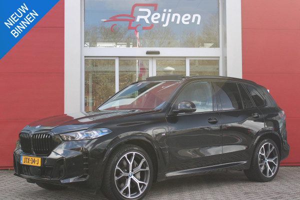 BMW X5 xDrive50e 490PK M-SPORT LAUNCH EDITION | PANORAMA SCHUIF/KANTEL DAK "SKY LOUNGE" | COMFORT STOELEN ELEKTRISCH VERSTELBAAR MET GEHEUGENFUNCTIE EN VERWARMBAAR VOOR EN ACHTER | LEDEREN BEKLEDING BMW INDIVIDUAL ZWART | EDELHOUT INTERIEURLIJSTEN | RIJASSISTENT-SYSTEEM DRIVING ASSISTANT PROFFESIONAL MET O.A. DODEHOEK DETECTIE EN ADAPTIVE CRUISE CONTROL | TRAVEL PAKKET | INNOVATIE-PAKKET: PARKEERASSISTENT-PAKKET PROFESSIONAL/ADAPTIEVE LED KOPLAMPEN/HARMAN/KARDON AUDIO SYSTEM/BMW LIVE PROFESSIONAL/RIJASSISTEN-SYSTEEM BMW GESTURE CONTROL/RIJSTROOK ASSISTENT/RIJSTROOKWISSEL ASSI