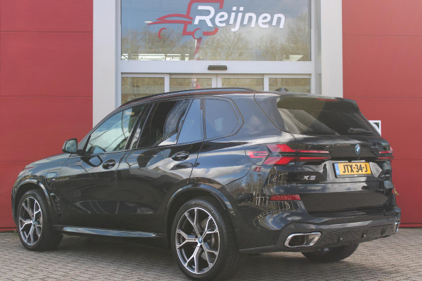 BMW X5 xDrive50e 490PK M-SPORT LAUNCH EDITION | PANORAMA SCHUIF/KANTEL DAK "SKY LOUNGE" | COMFORT STOELEN ELEKTRISCH VERSTELBAAR MET GEHEUGENFUNCTIE EN VERWARMBAAR VOOR EN ACHTER | LEDEREN BEKLEDING BMW INDIVIDUAL ZWART | EDELHOUT INTERIEURLIJSTEN | RIJASSISTENT-SYSTEEM DRIVING ASSISTANT PROFFESIONAL MET O.A. DODEHOEK DETECTIE EN ADAPTIVE CRUISE CONTROL | TRAVEL PAKKET | INNOVATIE-PAKKET: PARKEERASSISTENT-PAKKET PROFESSIONAL/ADAPTIEVE LED KOPLAMPEN/HARMAN/KARDON AUDIO SYSTEM/BMW LIVE PROFESSIONAL/RIJASSISTEN-SYSTEEM BMW GESTURE CONTROL/RIJSTROOK ASSISTENT/RIJSTROOKWISSEL ASSI