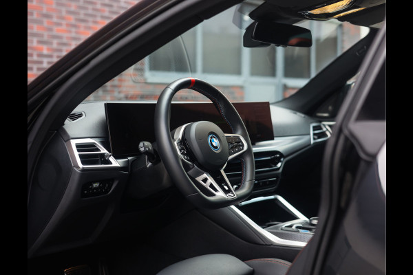 BMW i4 M50 84 kWh | Pano - Trekhaak - Harman Kardon