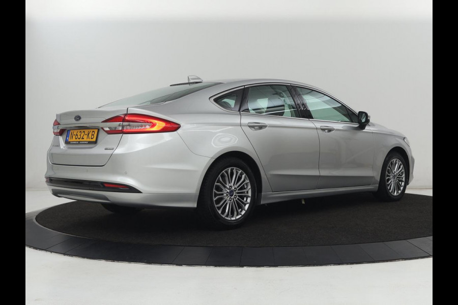 Ford Mondeo 2.0 IVCT HEV Titanium | Stoelverwarming | Carplay | Keyless | Navigatie | Climate control | Parkeerhulp | Cruise control | Bluetooth | DAB | Verwarmde voorruit