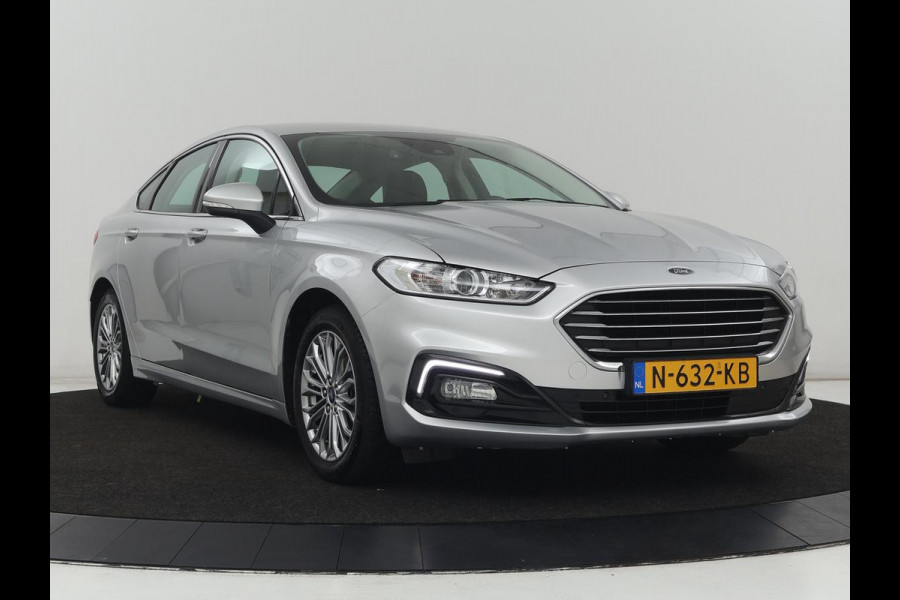 Ford Mondeo 2.0 IVCT HEV Titanium | Stoelverwarming | Carplay | Keyless | Navigatie | Climate control | Parkeerhulp | Cruise control | Bluetooth | DAB | Verwarmde voorruit