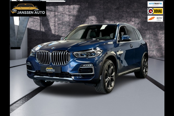 BMW X5 XDrive40i High Executive | H&K | Luchtvering | 21 inch | Multicontour stoelen | HUD | Luchtvering
