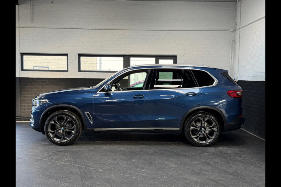 BMW X5 XDrive40i High Executive | H&K | Luchtvering | 21 inch | Multicontour stoelen | HUD | Luchtvering