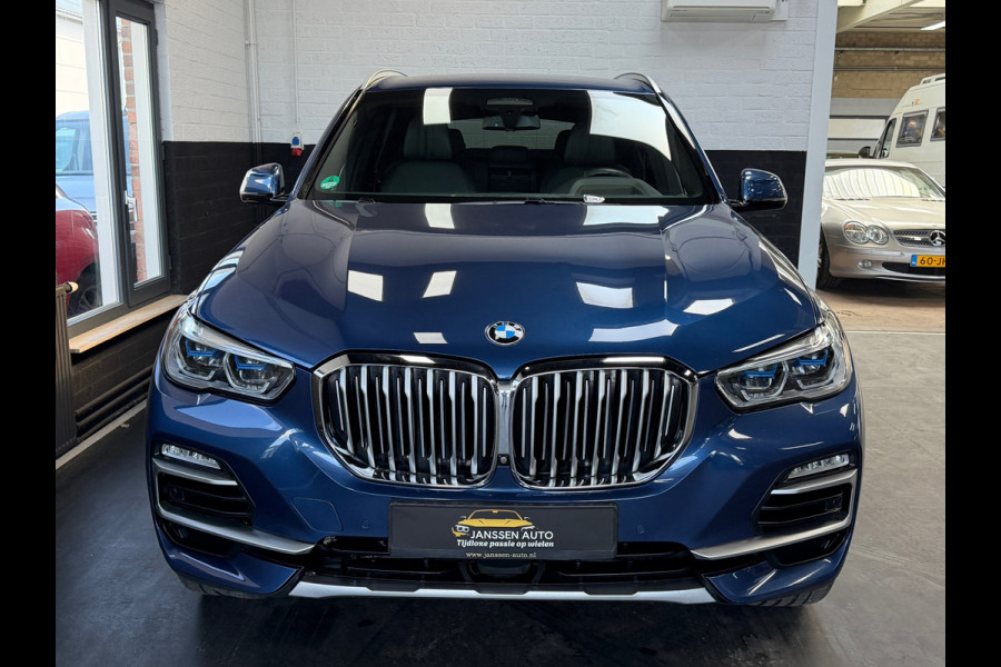 BMW X5 XDrive40i High Executive | H&K | Luchtvering | 21 inch | Multicontour stoelen | HUD | Luchtvering