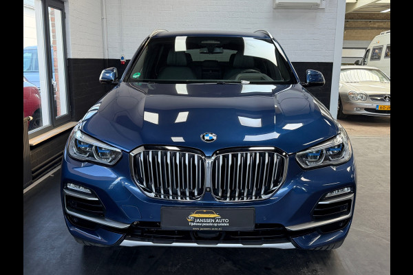BMW X5 XDrive40i High Executive | H&K | Luchtvering | 21 inch | Multicontour stoelen | HUD | Luchtvering
