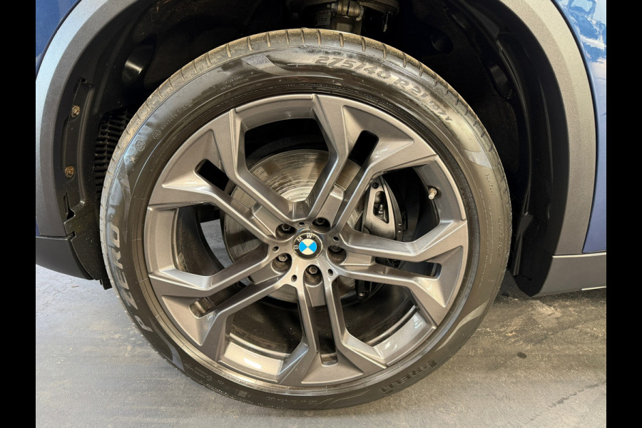 BMW X5 XDrive40i High Executive | H&K | Luchtvering | 21 inch | Multicontour stoelen | HUD | Luchtvering