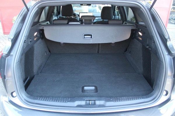 Ford FOCUS Wagon 1.0 155PK AUTOMAAT Hybrid ST LINE | ALL SEASON BANDEN | NAVIGATIE | DRAADLOZE APPLE CARPLAY/ANDROID AUTO | ADAPTIVE CRUISE CONTROL | LANE ASSIST | DODEHOEK DETECTIE | PARKEERSENSOREN VOOR + ACHTER | ACHTERUITRIJ CAMERA | LICHTMETALEN VELGEN 17" | DAB+ RADIO |