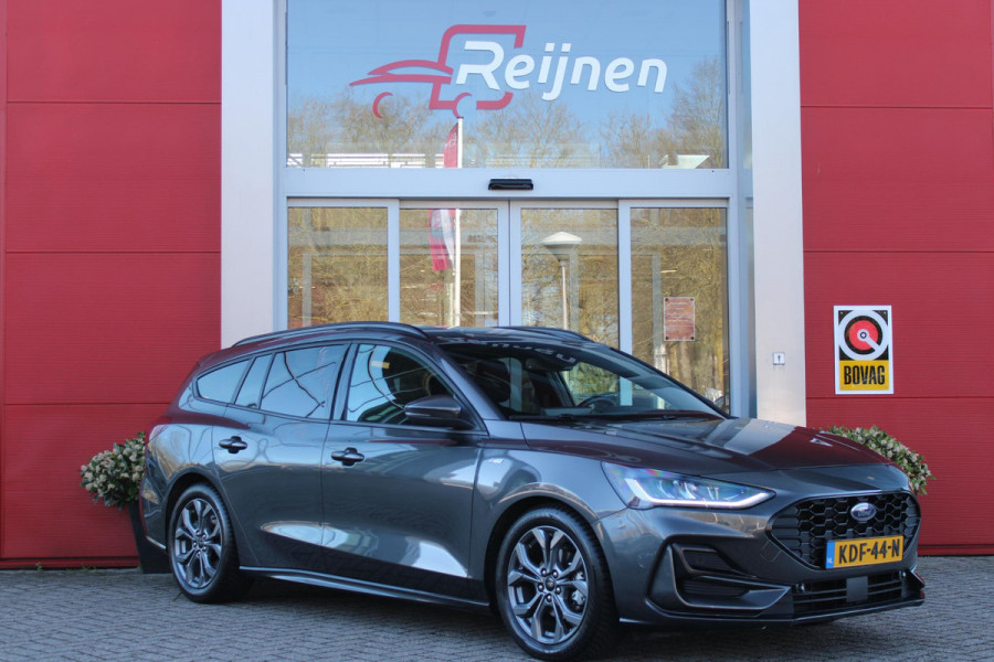 Ford FOCUS Wagon 1.0 155PK AUTOMAAT Hybrid ST LINE | ALL SEASON BANDEN | NAVIGATIE | DRAADLOZE APPLE CARPLAY/ANDROID AUTO | ADAPTIVE CRUISE CONTROL | LANE ASSIST | DODEHOEK DETECTIE | PARKEERSENSOREN VOOR + ACHTER | ACHTERUITRIJ CAMERA | LICHTMETALEN VELGEN 17" | DAB+ RADIO |