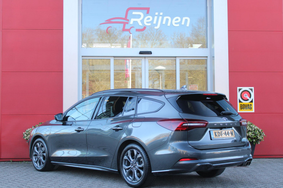 Ford FOCUS Wagon 1.0 155PK AUTOMAAT Hybrid ST LINE | ALL SEASON BANDEN | NAVIGATIE | DRAADLOZE APPLE CARPLAY/ANDROID AUTO | ADAPTIVE CRUISE CONTROL | LANE ASSIST | DODEHOEK DETECTIE | PARKEERSENSOREN VOOR + ACHTER | ACHTERUITRIJ CAMERA | LICHTMETALEN VELGEN 17" | DAB+ RADIO |
