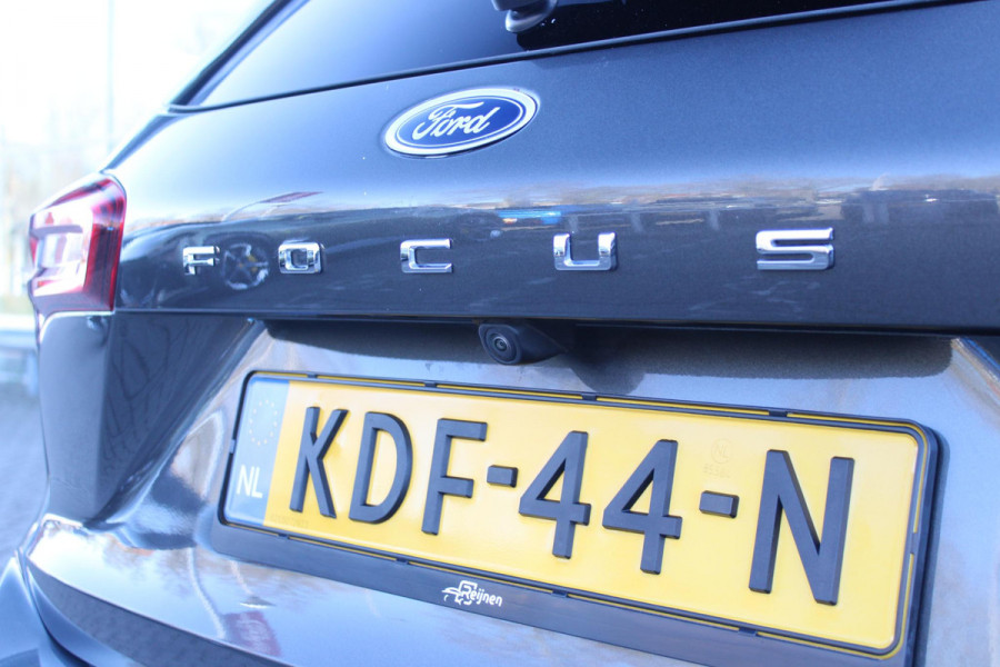Ford FOCUS Wagon 1.0 155PK AUTOMAAT Hybrid ST LINE | ALL SEASON BANDEN | NAVIGATIE | DRAADLOZE APPLE CARPLAY/ANDROID AUTO | ADAPTIVE CRUISE CONTROL | LANE ASSIST | DODEHOEK DETECTIE | PARKEERSENSOREN VOOR + ACHTER | ACHTERUITRIJ CAMERA | LICHTMETALEN VELGEN 17" | DAB+ RADIO |