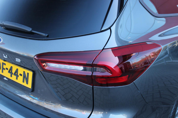 Ford FOCUS Wagon 1.0 155PK AUTOMAAT Hybrid ST LINE | ALL SEASON BANDEN | NAVIGATIE | DRAADLOZE APPLE CARPLAY/ANDROID AUTO | ADAPTIVE CRUISE CONTROL | LANE ASSIST | DODEHOEK DETECTIE | PARKEERSENSOREN VOOR + ACHTER | ACHTERUITRIJ CAMERA | LICHTMETALEN VELGEN 17" | DAB+ RADIO |