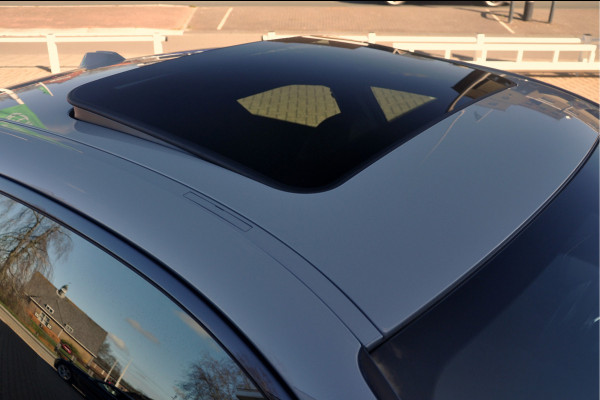 BMW 2 Serie Coupé 220i High Executive | Brooklyn Grey | Schuifdak