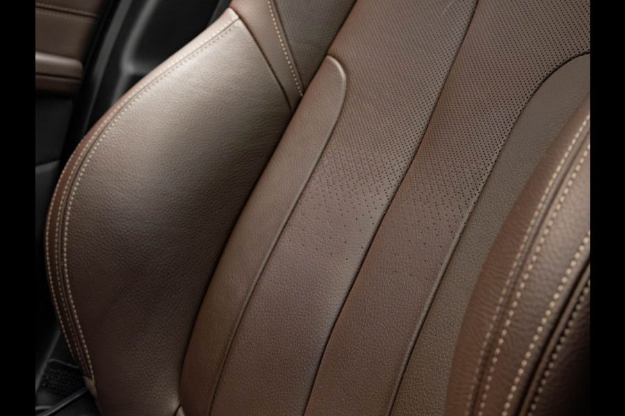 BMW X1 sDrive20i M-Sport - Pano - Trekhaak - Memoryzetel - Camera - Harman Kardon