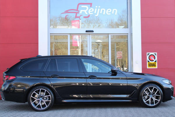 BMW 5 Serie Touring 530e 292PK xDrive M-SPORT BUSINESS EDITION PLUS | PANORAMA SCHUIF/KANTEL DAK | HARMAN KARDON AUDIO SYSTEM | LEDEREN BEKLEDING DAKOTA SCHWARZ | COMFORT ACCESS | HEAD UP DISPLAY | ZONNESCHERM ZIJRUITEN | ADAPTIEVE LED KOPLAMPEN | DRIVING ASSISTANT PROFESSIONAL MET O.A. ADAPTIVE CRUISE CONTROL EN DODEHOEK DETECTIE | ACHTERUITRIJ CAMERA | PARKEERSENSOREN VOOR + ACHTER | DRAADLOZE APPLE CARPLAY/ANDROID AUTO | NAVIGATIE | SFEER VERLICHTING | DRAADLOZE TELEFOONLADER | ELEKTRISCH BEDIENBARE VOORSTOELEN |
