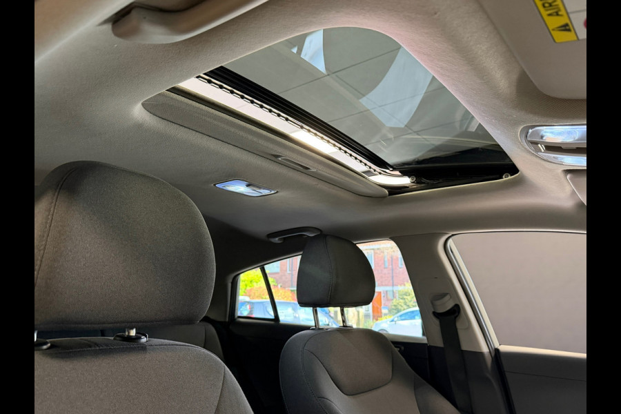 Hyundai IONIQ STYLE EV 38 kWh SOH 93,4% AUT SCHUIFDAK STOEL/ STUURVERWARMING CAMERA NAVIGATIE APPLE CARPLAY CRUISE PDC AIRCO