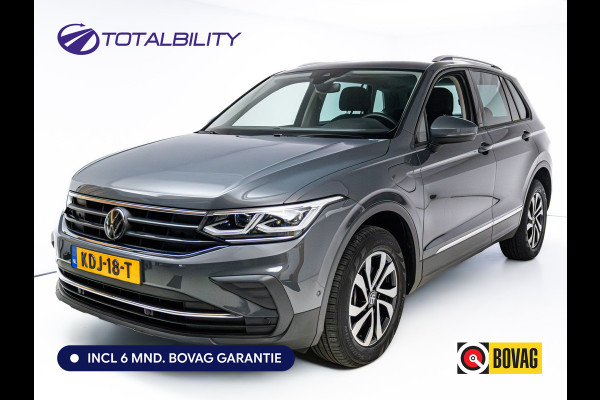 Volkswagen Tiguan 1.4 TSI eHybrid Active | Elec. Panodak | IQ Light | Elc. achterklep | Stoel- & Stuurverwarming | Adaptieve cruise, Camera, Automatisch inparkeren, All season banden