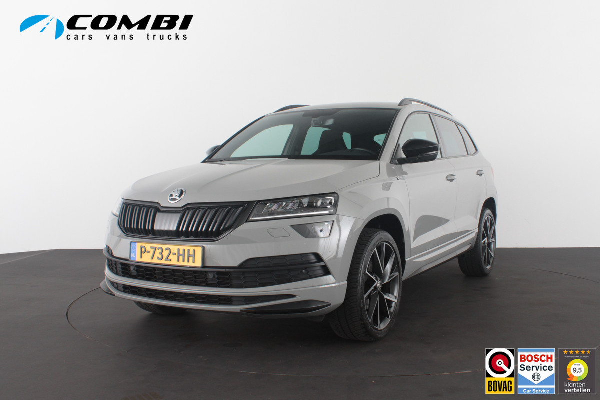 Škoda Karoq 1.5 TSI ACT Sportline Business > 150pk/Camera/Trekhaak wegklapbaar/Steel Grey/19inch...
